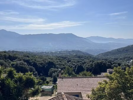 vente maison de village en pierres de taille  vue dégagée.