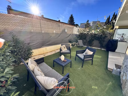 superbe 2 pièces en rdj avec terrasse et parking en sous-sol