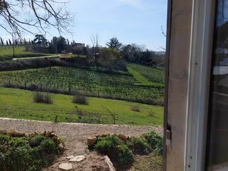 maison de bourg avec terrasse et parking dans bâtisse de 1827