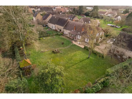 propriété de charme en pierre  193 m² habitables avec dépendances et terrain arboré