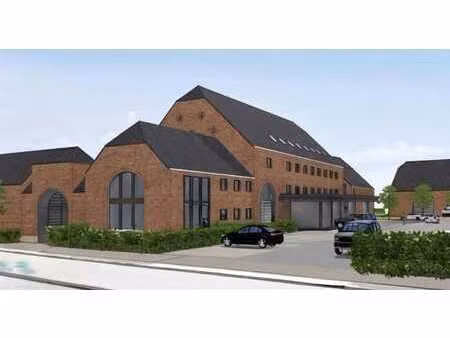 lot 1 – bâtiment à rue avec terrasse (± 180 m² exploitables)