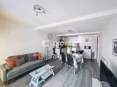 castelsarrasin centre-ville appartement t2 d'environ 51 m² rez-de-chaussée cour et véranda