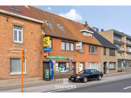 op te frissen gezinswoning met werkplaats in centrum helchteren