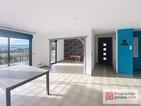 jolie maison de plain pied et ses deux garages aux portes de pont l'evêque  vue dégagée