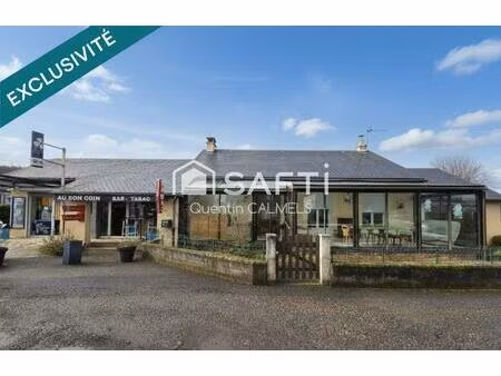 ensemble immobilier à nuces   maison de plain-pied et local commercial loué