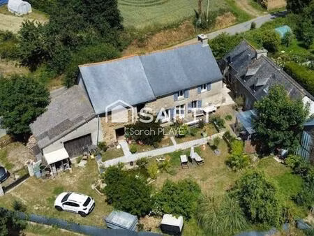 propriété composée de deux maisons  un garage  atelier  édifiée sur un terrain de 1240m2