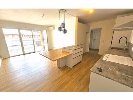 location appartement  58.57 m² t-3 à marseille 12  1 195 €