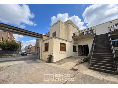 entrepôt avec bureaux à proximité de la gare rer et des grands axes routiers