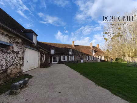 propriété avec 2 maisons  1 bureau  un jardin et des dépendan