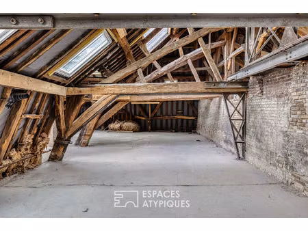 appartement loft sous combles en coeur de ville avec rooftop