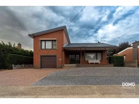 open bebouwing met 3 slaapkamers en veel potentieel in lummen”