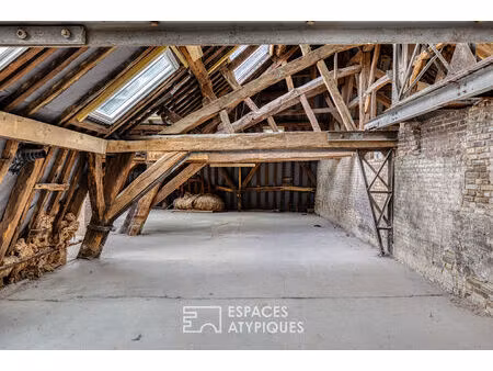 appartement loft sous combles en coeur de ville avec rooftop