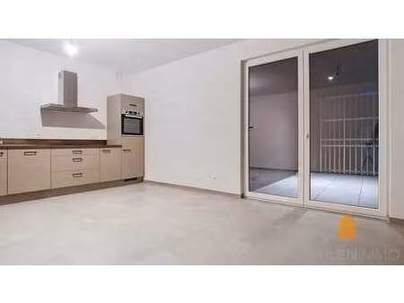 appartement 2 ch. + terrasse + 2 parkings couverts