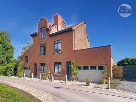 a vendre - maison bifamilliale avec 4 chambres  2 garages et