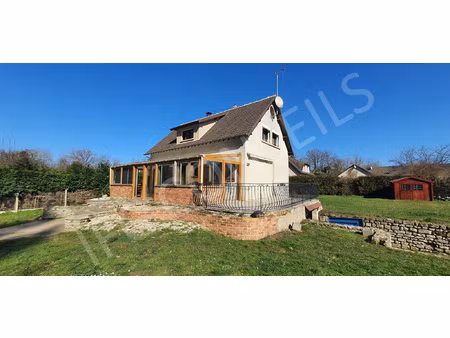 pavillon des années 80 d'environ 112 m2 avec 3 chambres