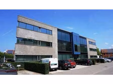 immeuble de rapport à vendre le long de l'e40 à merelbeke-m