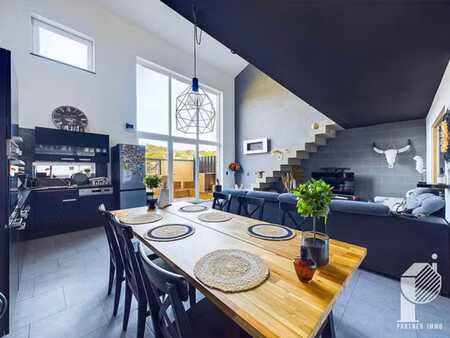 loft 2 chambres (poss.3) avec terrasse et 2 pl. de parking.