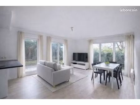 f4 lumineux avec jardin  2 parkings  cave