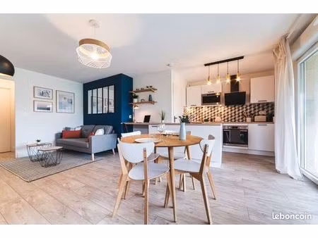 t2 neuf : balcon + parking