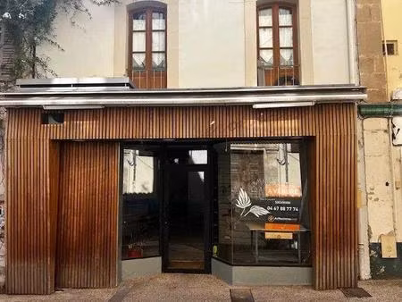 boutique en centre ville et un appartement