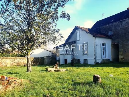 maison 4 pièces + grand jardin clos  proche centre ville et gare.