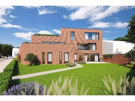 nieuwbouwproject in genk met 3 woningen en 5 appartementen