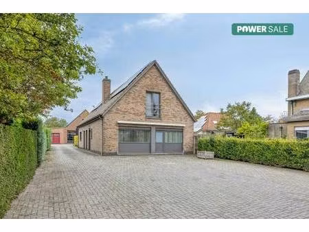 unieke handelswoning met magazijn in zomergem