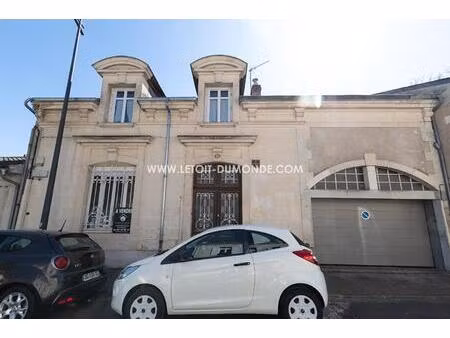 maison 5 pièce(s) 125 m2 avec une cour jardin  en centre-ville de périgueux