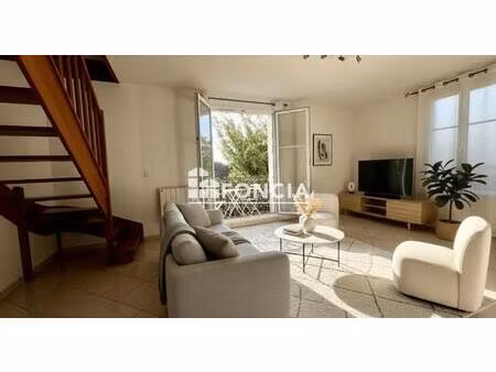 f3 proche écoles et commerces