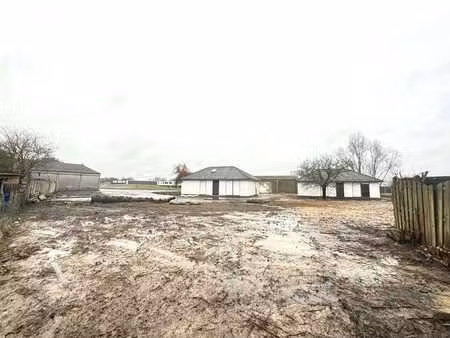 terrain industrielle avec 2 villas