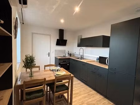 maison divisée en 2 logements