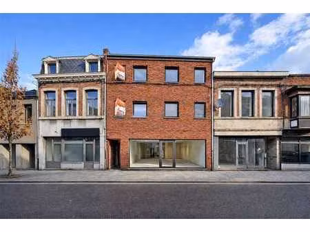 nouvelle construction : rez commercial  cour & jardin