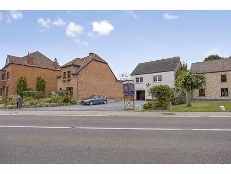 opbrengsteigendom bestaande uit twee ruime en verhuurde appartementen in herk-de-stad