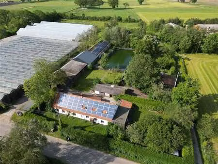spacieuse ferme avec jardin d'hiver sur 14 054m² à malle