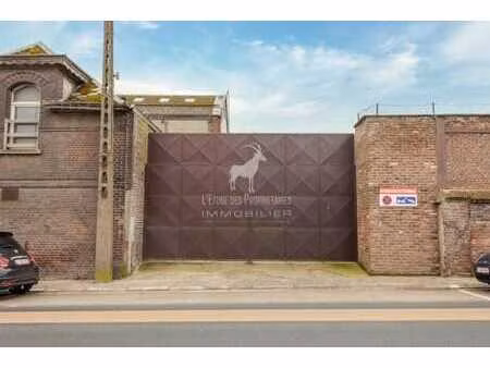 terrain avec entrepôt hangar à vendre à monceau-sur-sambre