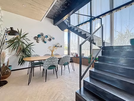 villa de luxe à vendre proche puybrun : couloir de nage à débordement  véranda avec spa  c