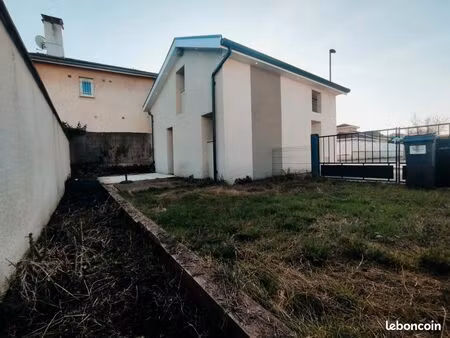 maison 57m2 sur 150m2