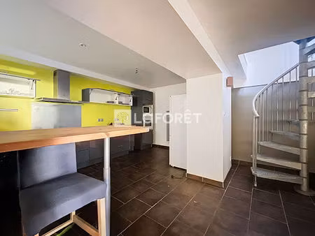 immeuble mixte avec habitation libre et local commercial loué
