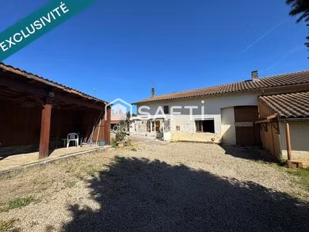 maison à fort potentiel dans un environnement privilégié