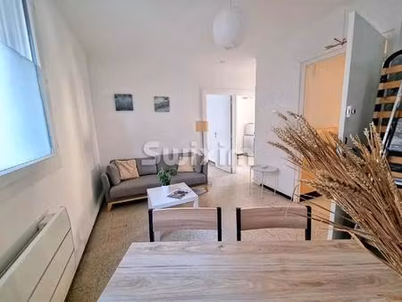 immeuble comprenant avec 2 appartements et garage