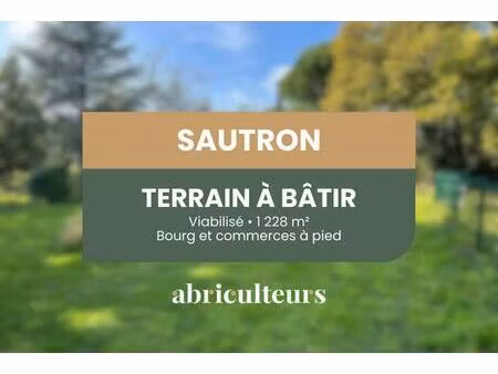 grande parcelle à bâtir en plein cœur de sautron - terrain viabilisé dans un environnement
