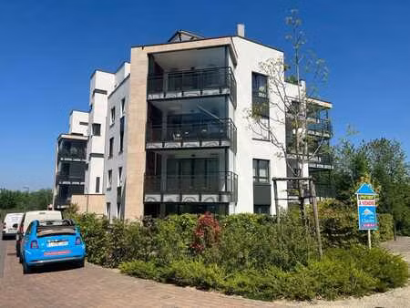 rez-de-chaussée neuf de 124m² avec jardin d'hiver