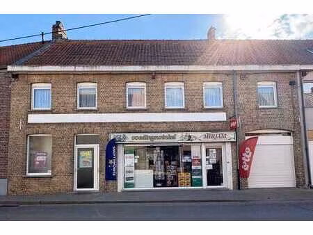 verzorgd woon- en handelshuis met tuin en garage in het c...