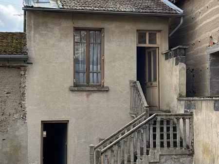 à courpière  maison de bourg d'environ 29.9m2 avec terrain e