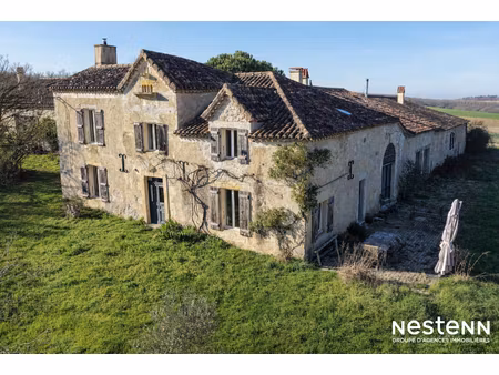 a vendre propriété de plus 3 5 ha avec lac  maison en pierre rénovée  gîte et dépendances