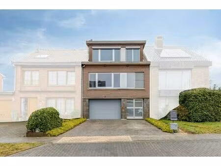 centraal  verzorgd en stijlvol appartement met tuin en garage