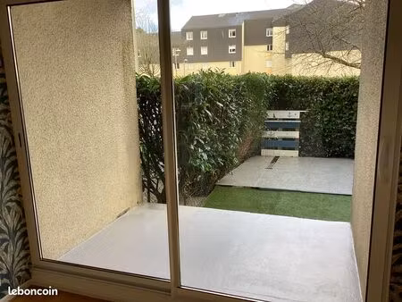 f2 avec jardin privatif et parking en s/sol