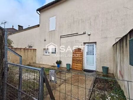 maison mitoyenne  2 chambres  cours et double garage