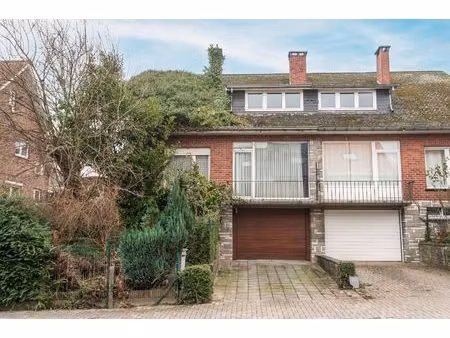 solide woning met 3 slpks  tuin en garage te buizingen