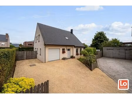 in optie!! degelijke  ruime en lichtrijke open woning met inpandige garage op een rustige 